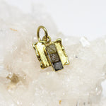 Anhänger 333 Gelbgold mit Rohdiamant