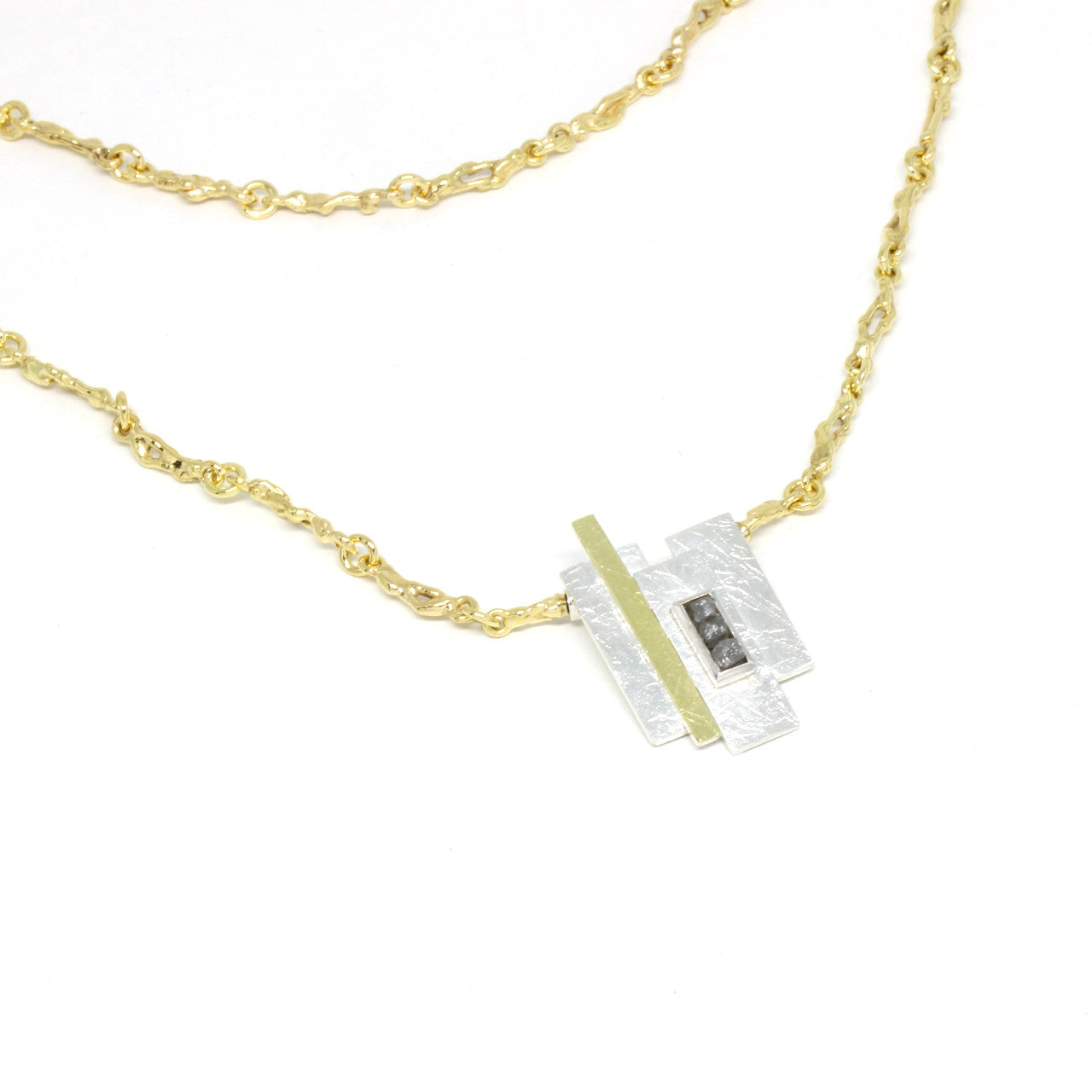 Wechselschließe Silber mit 750er Gelbgold und Rohdiamant