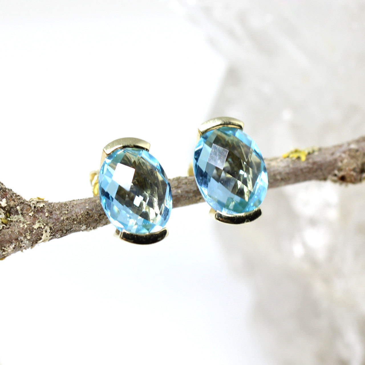 Ohrstecker in 585er Gelbgold mit Blautopas