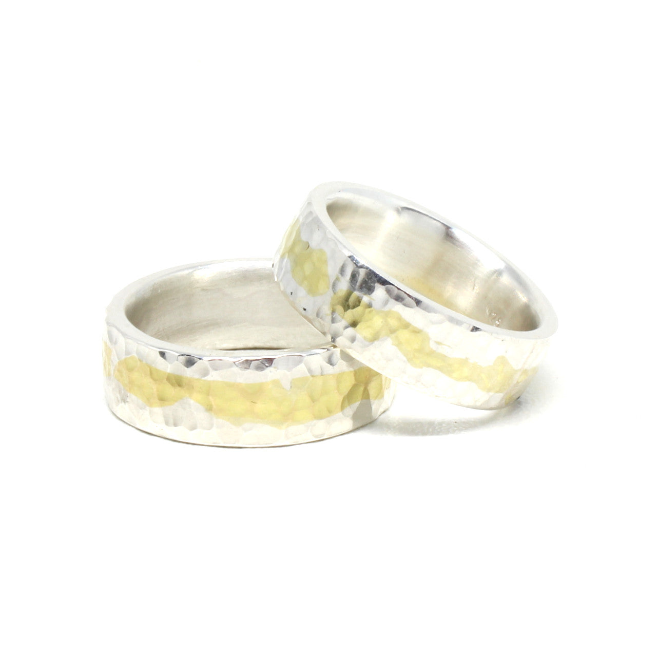 Trauringe Handarbeit in Silber mit 750 Gelbgold
